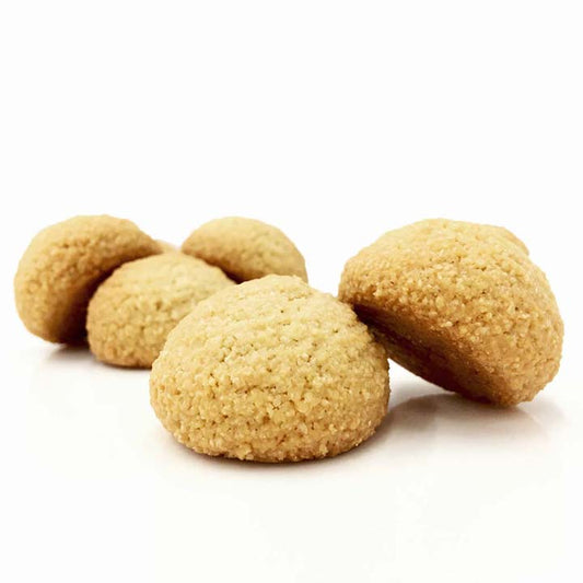 Close up of a golden delicious almond amaretti macaroon cookies that are gluten free, dairy free, soy free, kosher, corn free, grain free