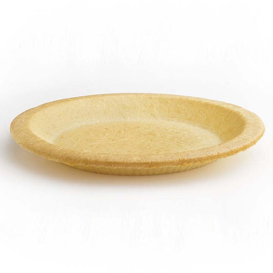 Golden baked empty almond pie shell crust