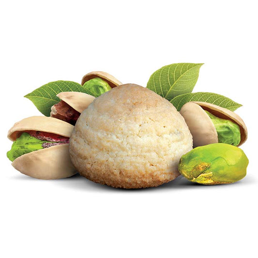 Flavour image of pistachioretti almond macaroon cookie with pistachios in and out of shells behind cookie on white background