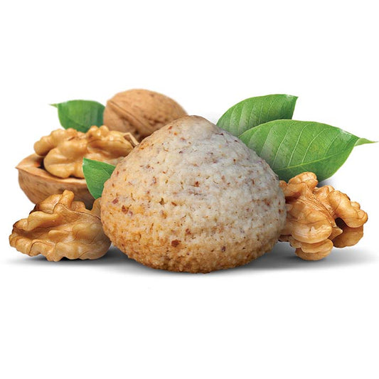 Flavour image of walnutti almond macaroon amaretti cookie with whole shelled and deshelled walnuts behind cookie on white background