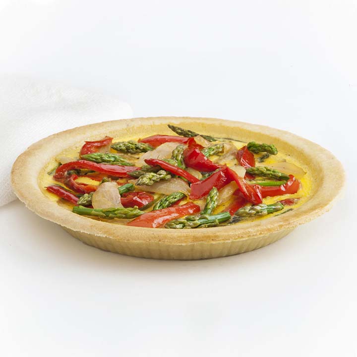 Gluten-free spinach quiche baked in an almond pie crust