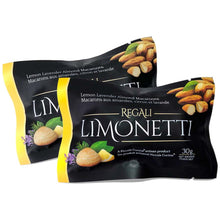 Load image into Gallery viewer, Two gluten free, dairy free limonetti lemon lavender Italian amaretti almond macaroon cookies in black single serving grab and go packaging by Piccola Cucina 
