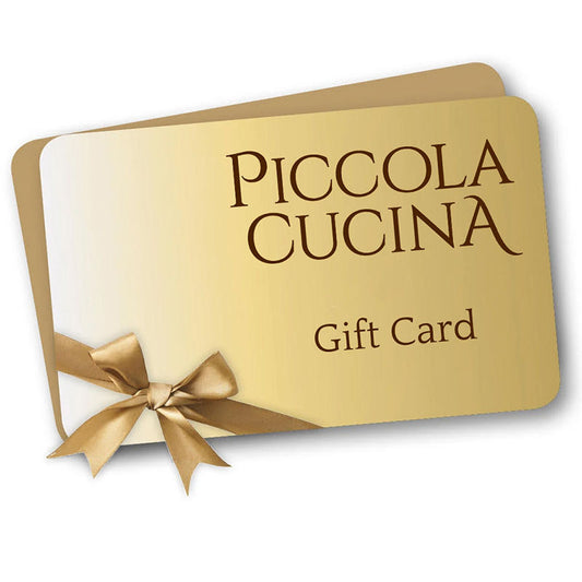 gold piccola cucina gift card with gold bow on white background